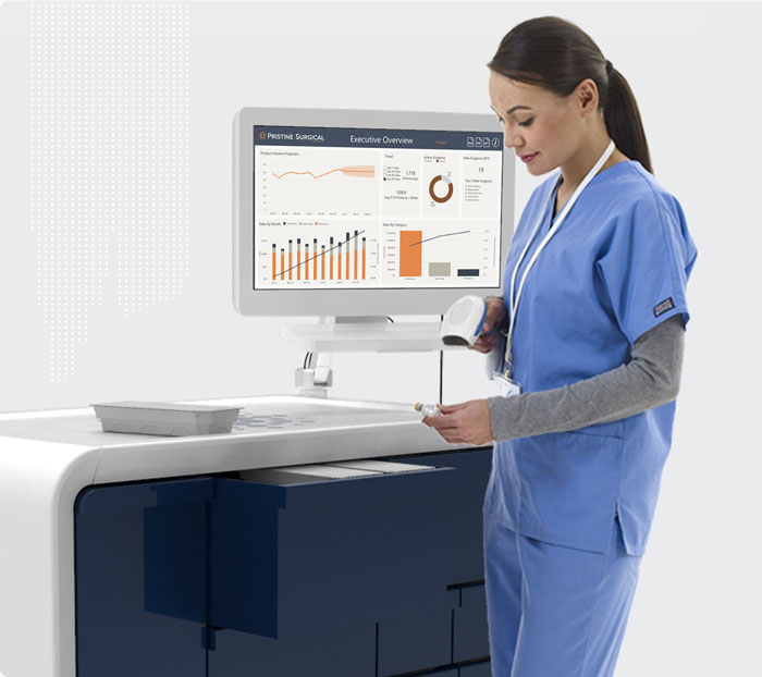Medical professional with computer monitor and table